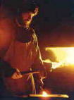 anvils  anvil making  anvil repair  air hammer  artist blacksmiths  ABANA  alloy  bellows  blower  blacksmith  blacksmiths  blacksmithing  blacksmithing books  blacksmithing links  blacksmithing machinery  blacksmithing tools  blacksmiths's forge  blacksmith's tongs  blacksmith's guru  blade smithing   do-it-yourself   coal  coke  charcoal  charcoal forge  forge  forging  forge plans  forge welding  fabricator  gas forge  great bellows  grinders  grinding  propane forge  iron  ironwork  ironworks  junk yard hammer  JYH  knives  knife making  hammer  hammer-in  heat treating  hardy   iron   power hammer   pritchel  oil forge   quench tank  quench  smith  smithy  steel   steam hammer  slack tub  tempering  trip hammer  tongs  tools  machinery plans  metal  metalwork   weld   welding   arc  welding   wrought iron   blacksmith forum   blacksmiths FAQs - Self portrait (c) 1989 Jock Dempsey