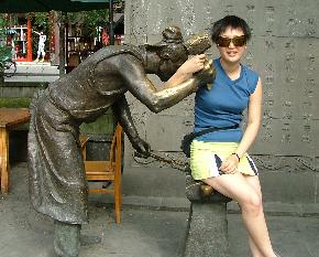 Linna with Blacksmith Statue in Dujiangyan China