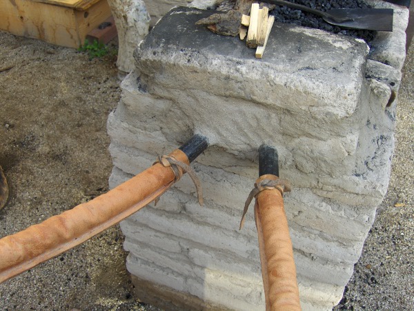 Leather Hoses conecting bellows to forge