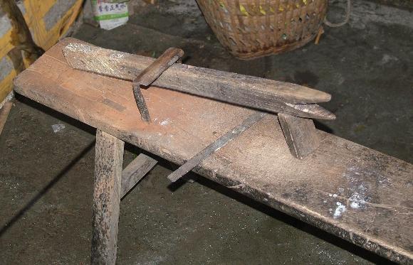 Chinese clamping bench or scraping horse.