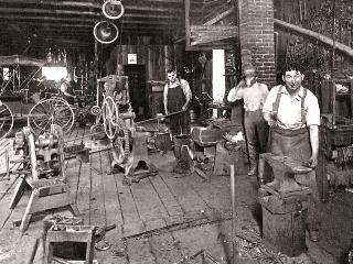 Turn of the century blacksmith shop photo from by Gill Fahrenwald