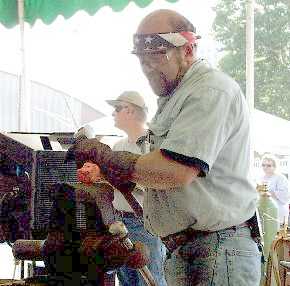 Daryl Nelson demonstrating forging animal heads.