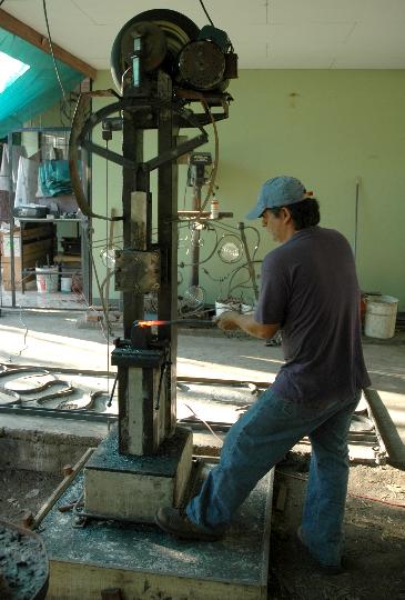 Allen Barth of Grecia, Costa Rica forging on the tirehammer